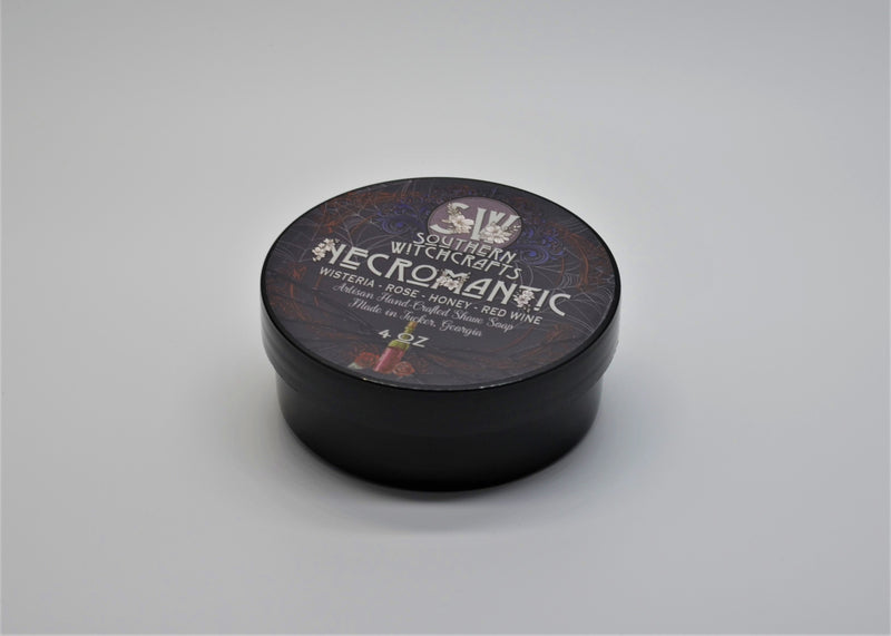 Necromantic is a bold and unique fragrance which evokes imagery of love, romance, and death, perfect for a crisp Autumn shave in a graveyard. Scent notes: Rose, wisteria, honey, red wine, dirt, ozone Ingredients: Water, stearic acid, shea butter, castor oil, potassium hydroxide, glycerine, coconut oil, sodium lactate, sodium hydroxide, jojoba oil, aloe powder, liquid aloe, isopropyl myristate, kaolin clay, fragrance Net Weight 115g.